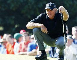 Norman on the first green at Masters