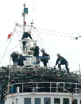 N. Korea ship raided on suspected drug violations, 3 men held