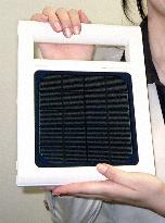 Portable solar panel for use as outdoor, emergency power source