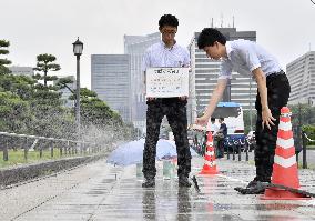 Tokyo tests water sprinklers to combat heat at 2020 Olympics