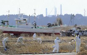 Police search for bodies from 2011 disaster