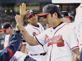 Braves' Kawakami gets 3rd win