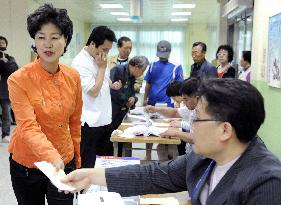 S. Koreans vote in local elections overshadowed by ship sinking