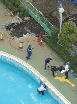 Police examine pool in Saitama