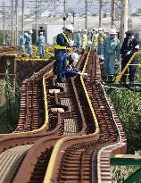 Typhoon Lan damages tracks in Japan