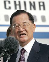 Ex-Taiwan opposition leader arrives in Beijing