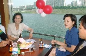 Three females accompany N. Korean delegation