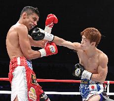 Boxing: Tanaka TKOs Fuentes to lift 2nd world title