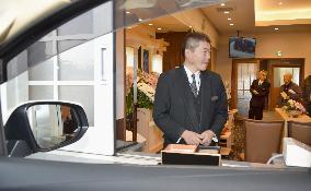 A funeral home with a drive-thru window will open in Japan