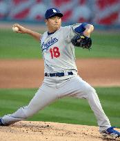 Dodgers' Kuroda makes strong season debut