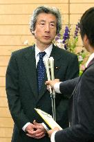 Koizumi airs view over talks with China's Hu