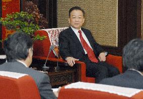 China's Wen hopes for successful Japan trip, China visit by Abe