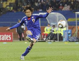 Japan overpower Denmark to cruise into last 16