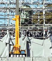 Sheets removed around Great Buddha in Kamakura