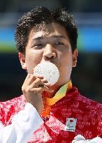 Japan's Sato wins silver in men's 400-meter