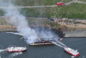 Houseboat in flames in Tokyo