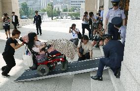 Japanese lawmaker with cerebral palsy
