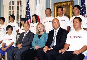 Clinton cheers students from Japan disaster areas