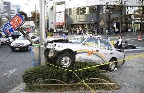 4 injured as taxi mounts sidewalk in central Tokyo