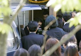 Relatives say farewell to murdered boy