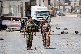 Kurdish soldiers in Syrian city of Raqqa