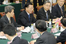 China, Taiwan hold official talks on bilateral ties