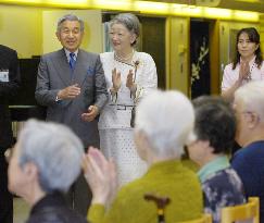 Emperor, empress visit nursing home in Tokyo