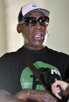 Rodman at Beijing airport