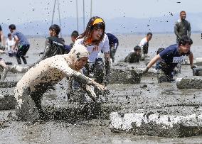 Muddy sports event in Japan