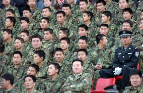 (3) China police on high alert at Japan-China soccer match