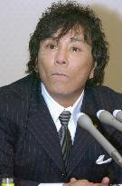 Ex-wrestler Onita to give up upper house seat