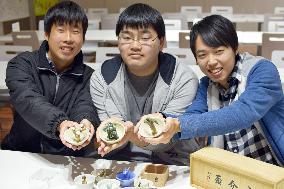 Students promote tricky sake cup dating back to feudal era
