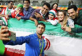 Olympic scenes: Photo with fans