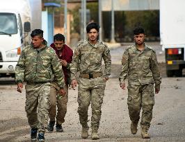 Kurdish soldiers in Syria