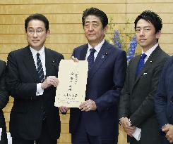 Japan PM Abe, LDP policy chief Kishida