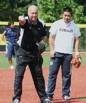 Japanese youths practice with baseball legend