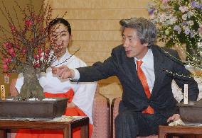 Koizumi presented with dwarfed plum trees