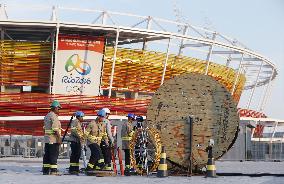 Citizens of Rio de Janeiro wait for start of Olympics