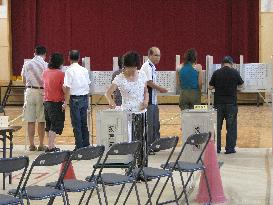 Voters line up at polling station