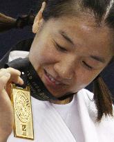 Tani wins gold in 48 kg weight class