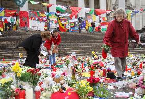 People mourn victims of terror attacks in Brussels