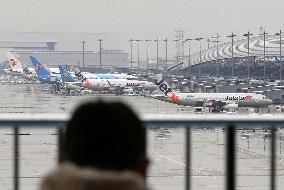Orix-led consortium begins running airports in western Japan
