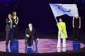 Tokyo Gov. Koike waves Paralympic flag at closing ceremony