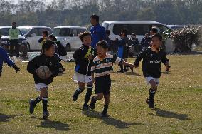 Kids playing rugby in Saitama