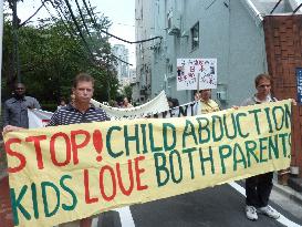 Parents march to address child custody issue