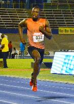 Athletics: Bolt breezes into 100m semis at national c'ships