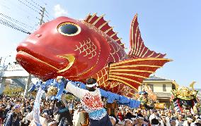 Colorful floats paraded at festival in southwestern Japan