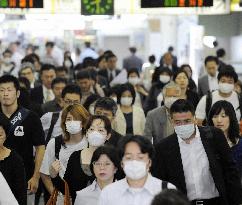 New flu in Tokyo area prompts firms to take precautionary steps