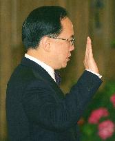 Donald Tsang officially takes office as new H.K. chief