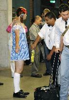'Dorothy' Tazawa of Boston goes thru security check